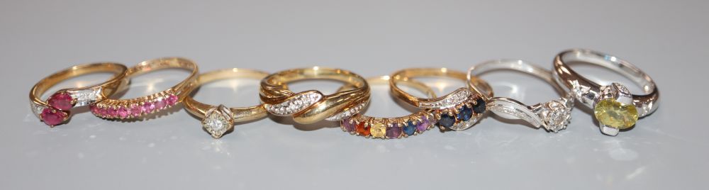 Eight assorted modern 9ct gold and gem set dress rings including diamonds and two white gold, gross 15.4 grams.